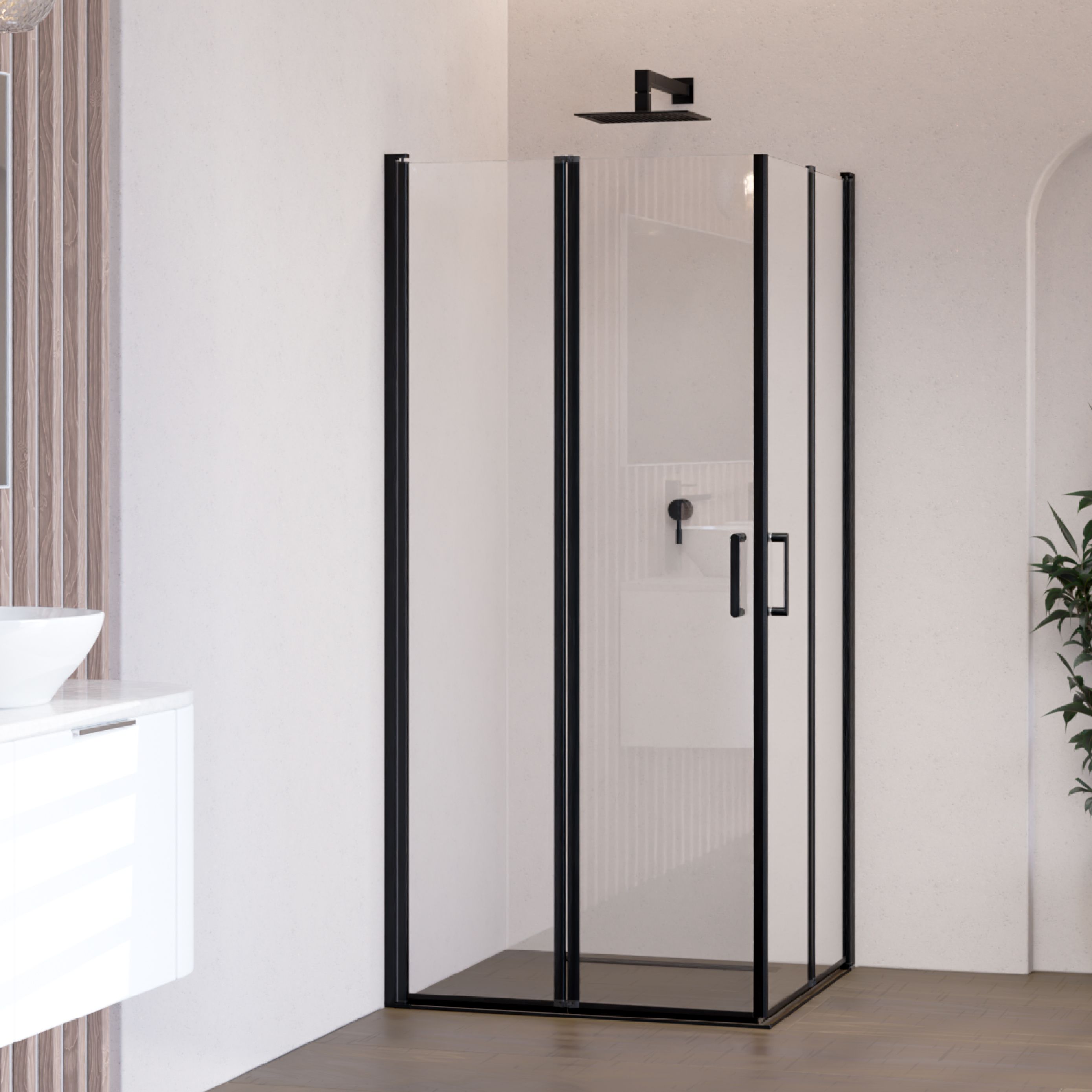 Corner entry Alina with folding doors and black profiles made of ESG safety glass. Alina – Corner entry with folding doors and black profiles made of ESG safety glass.