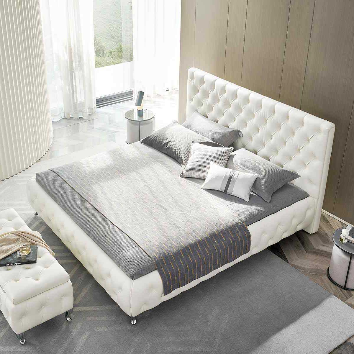 Design Polsterbett Amour in Weiß mit Lederknöpfen Amour – Design Polsterbett in Weiß mit Lederknöpfen